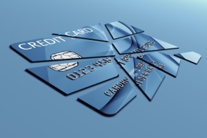 3d rendering of a credit card cut into pieces
